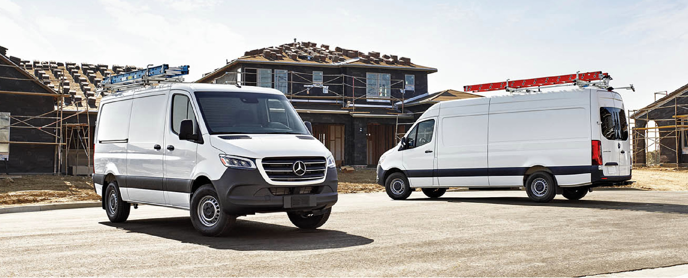 Two Mercedes-Benz Sprinter Van in a construction site
