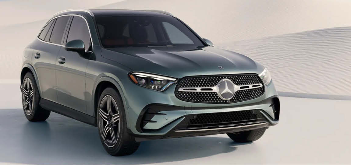 Mercedes-Benz luxury electric SUV parked in desert landscape