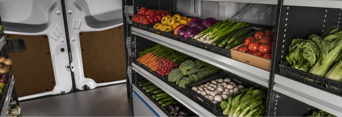 Mercedes-Benz Sprinter cargo van interior outfitted with shelving for fresh vegetables and produce delivery