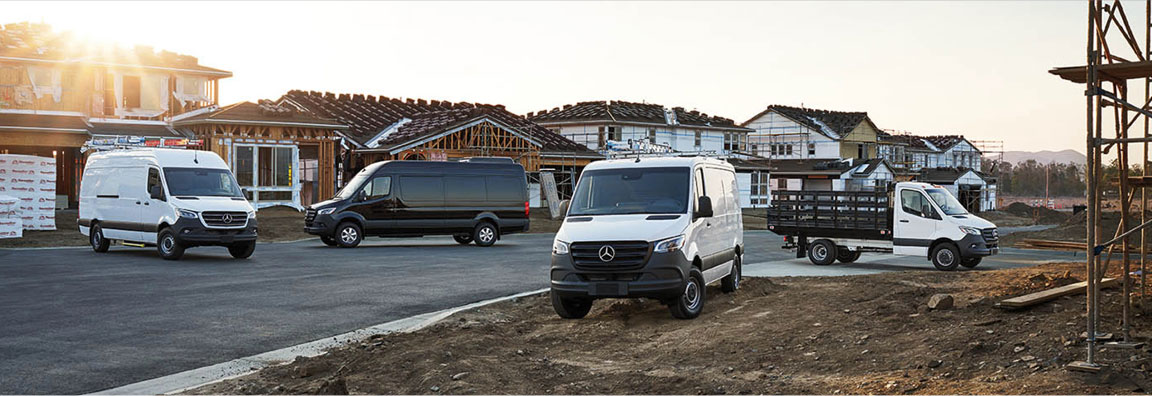 Mercedes-Benz commercial vans and chassis truck serving a residential construction development