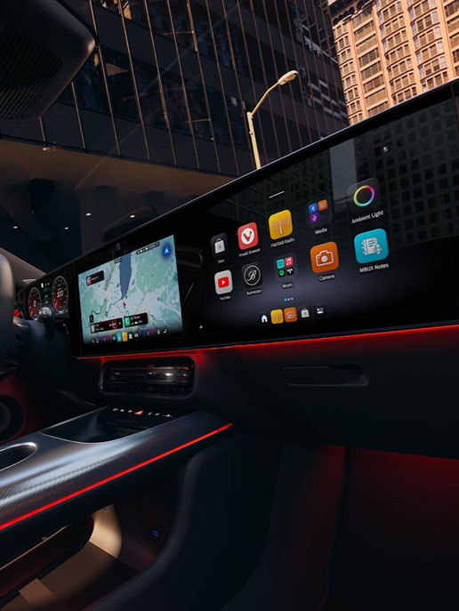 Mercedes-Benz MBUX Superscreen infotainment system with customizable ambient lighting and connected vehicle features