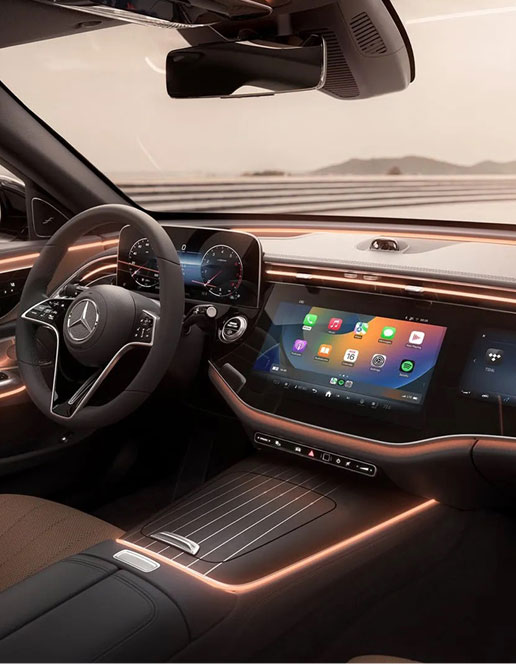 Mercedes-Benz luxury interior featuring digital instrument cluster and large touchscreen infotainment system