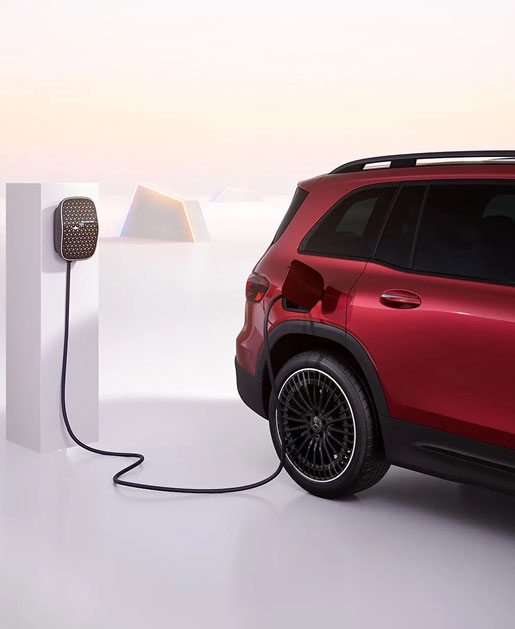 Mercedes-Benz electric SUV connected to home charging station
