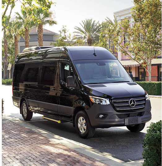 Mercedes-Benz Sprinter passenger van parked downtown