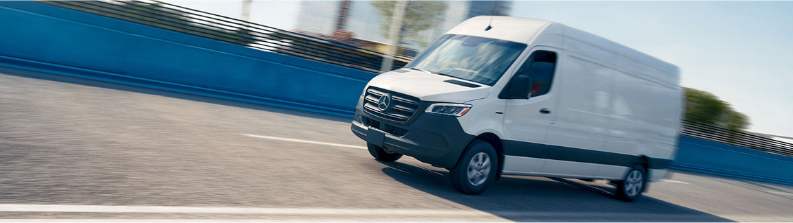 Mercedes-Benz Sprinter cargo van driving on highway