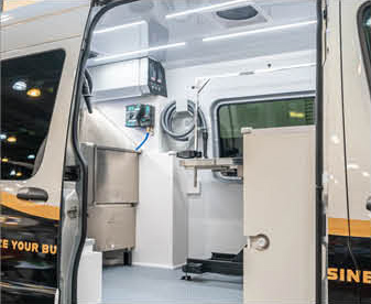 Interior of Mercedes-Benz Sprinter van customized for pet grooming business