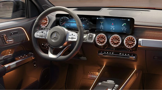 Mercedes-Benz luxury interior with digital dashboard ambient lighting and premium materials