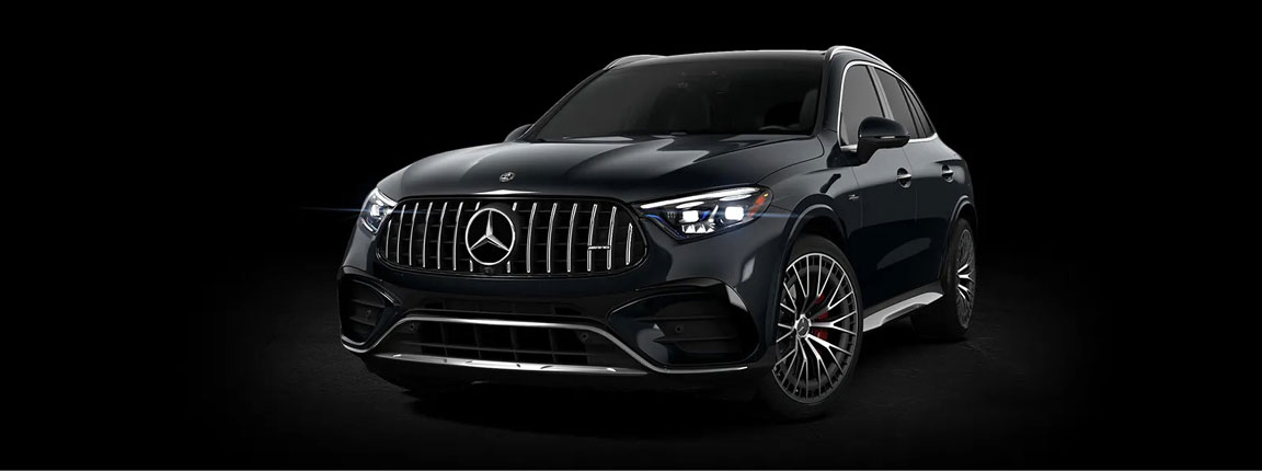 Black Mercedes-AMG GLC performance SUV showcasing aggressive grille design, AMG wheels, and sporty stance
