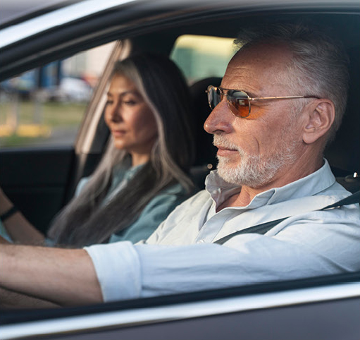 Couple driving inside a Mercedes-Benz GLE SUV