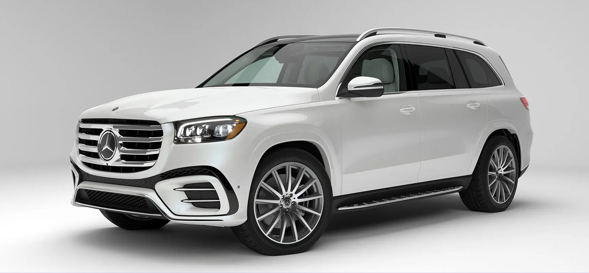 White Mercedes-Benz GLS SUV on a white studio background highlighting luxury exterior styling and premium design.