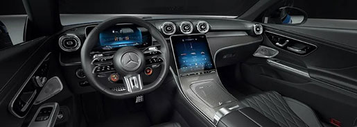 Mercedes-AMG CLA interior showcasing a driver-focused cockpit, performance steering wheel, digital displays, and premium craftsmanship
