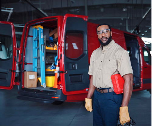 Service technician standing beside a fully equipped work van, highlighting mobile service operations, fleet management, and commercial vehicle organization