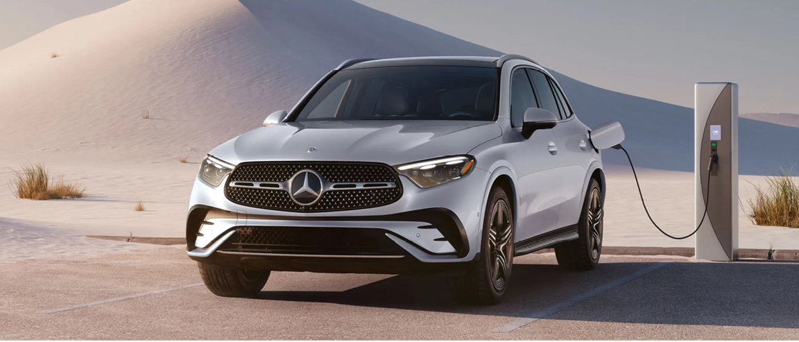 Mercedes-Benz GLE 450e 4MATIC plug-in hybrid SUV charging at residential charging station in Duluth Georgia