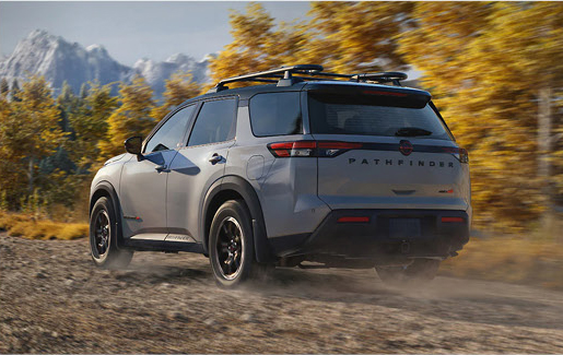 Rear view of the Nissan Pathfinder Rock Creek in motion highlighting rugged styling and outdoor-focused design