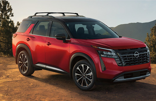 Nissan Pathfinder in red showcasing bold exterior styling, modern SUV design, and family-friendly versatility