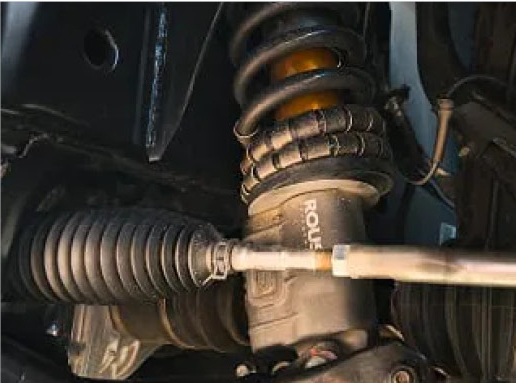 Nissan Frontier PRO-4X suspension system highlighting off-road-tuned shocks and rugged engineering for challenging terrain