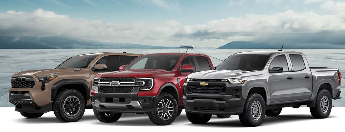 mid size pickup truck comparison featuring Toyota Tacoma Ford Ranger and Chevrolet Colorado parked side by side