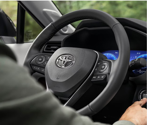 Toyota steering wheel with driver starting vehicle using push-button ignition