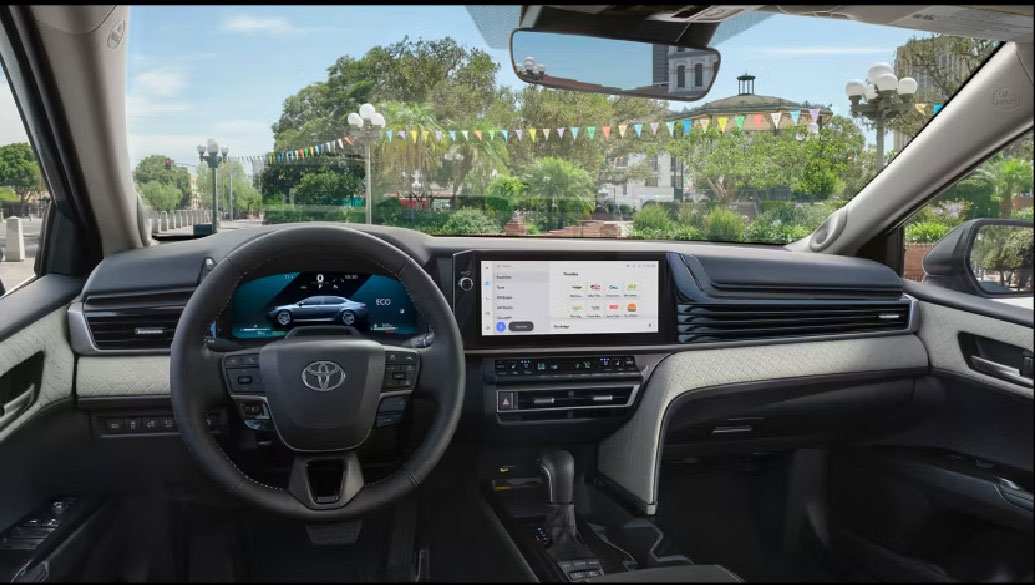 Toyota Avalon interior cockpit view with touchscreen and digital gauges