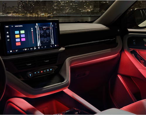 Ford Explorer cabin featuring ambient interior lighting, digital touchscreen, and premium technology features