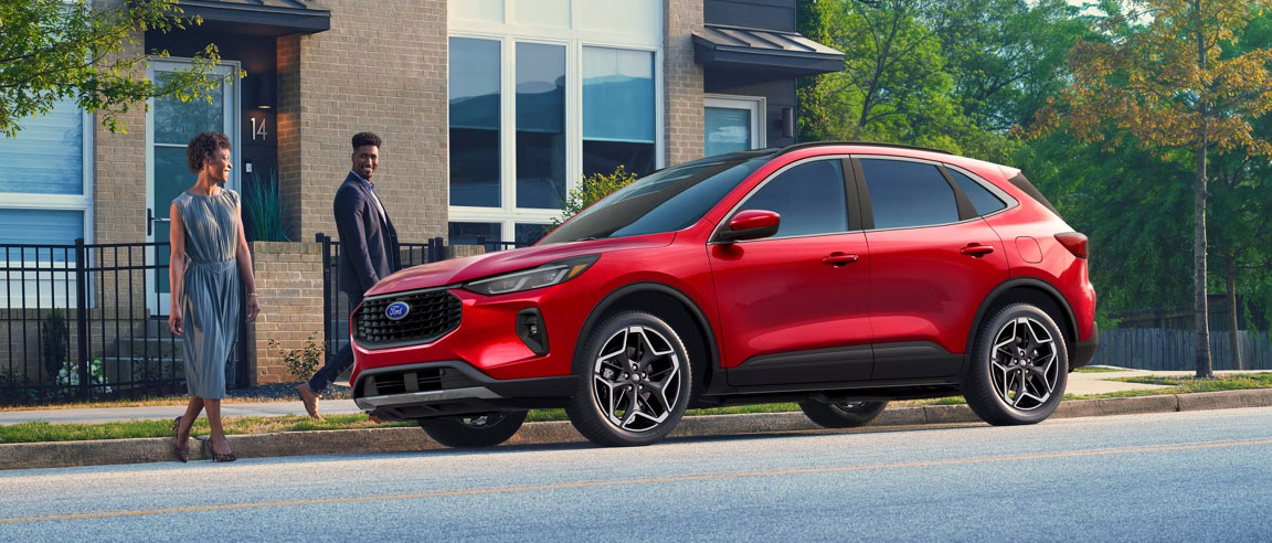 a Ford Vehicle parked on the street