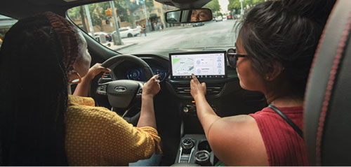 a family inside a Ford Vehicle