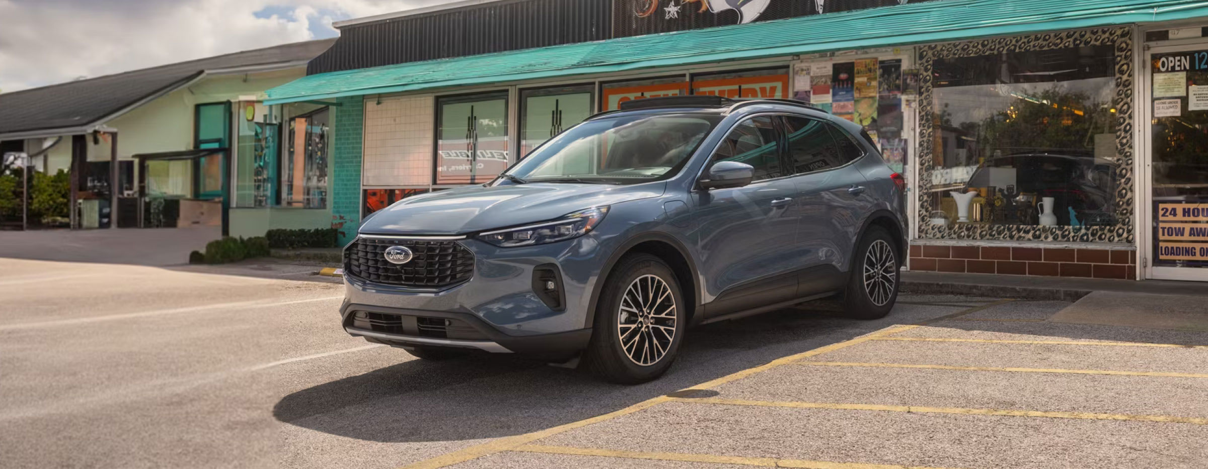 Ford Escape parked in front of local shops