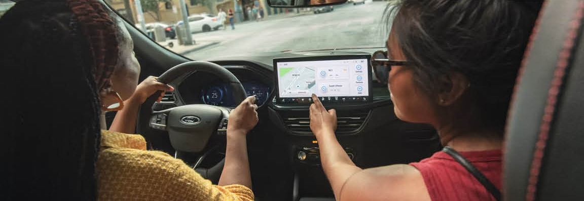 Ford Escape interior featuring touchscreen infotainment and navigation system