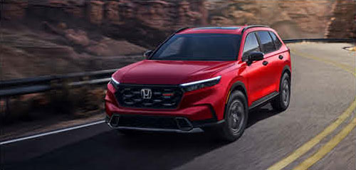 Honda CR-V SUV driving on a winding mountain road