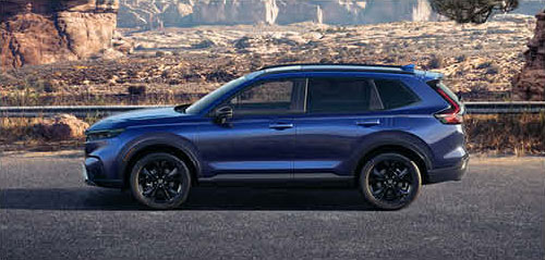 Honda CR-V side profile parked near scenic landscape