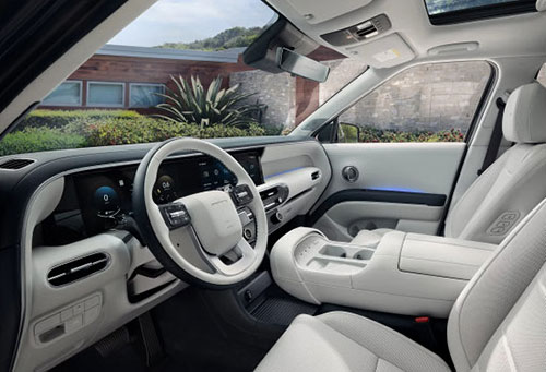Modern SUV interior with digital dashboard and premium white leather seats