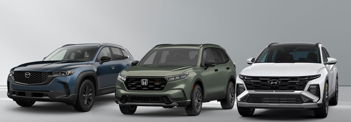 Compact SUV comparison featuring the Mazda CX-50, Honda CR-V TrailSport, and Hyundai Tucson, highlighting design, features, and crossover versatility