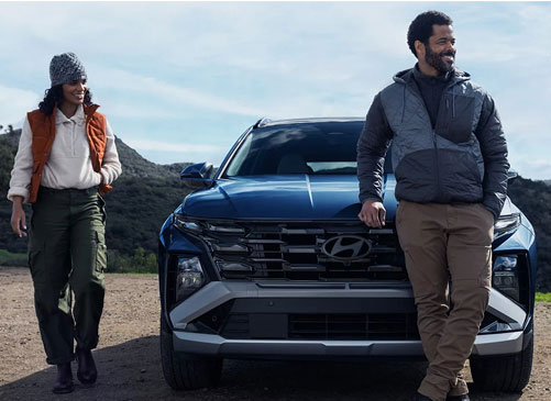 Hyundai Tucson SUV with outdoor lifestyle imagery, highlighting modern styling, adventure-ready versatility, and active living appeal