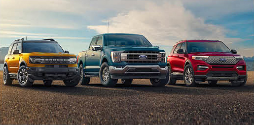 Ford Bronco Sport, Ford F-150, and Ford Explorer parked side by side
