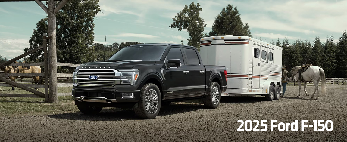 2025 Ford F-150 driving on the road.