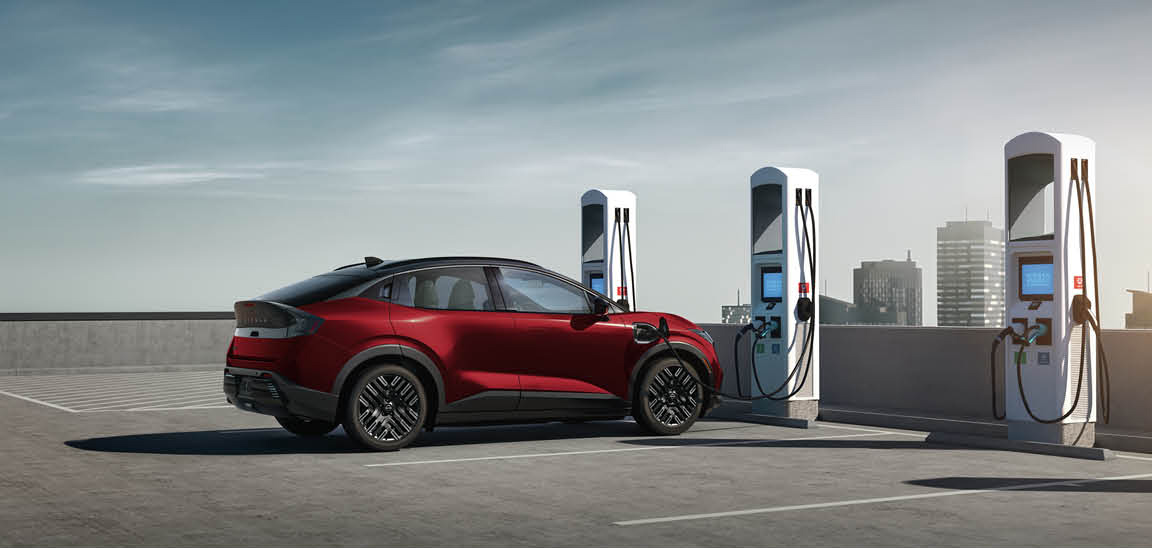 Ford Mustang Mach-E electric SUV charging at a public EV charging station