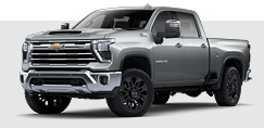 Chevrolet Silverado HD heavy-duty pickup truck in gray on light background