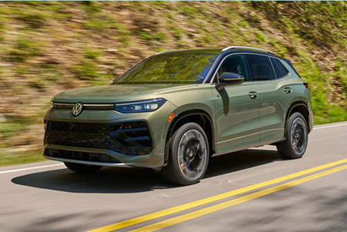 Volkswagen Atlas Cross Sport driving on a mountain road