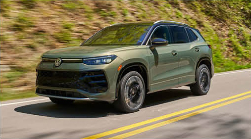 Volkswagen Tiguan SUV driving on a scenic road