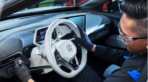 Volkswagen vehicle interior dashboard and steering wheel during service inspection