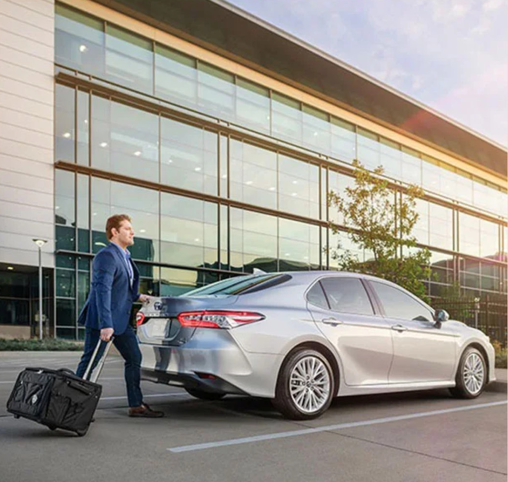 a Toyota Camry parked at the ariport