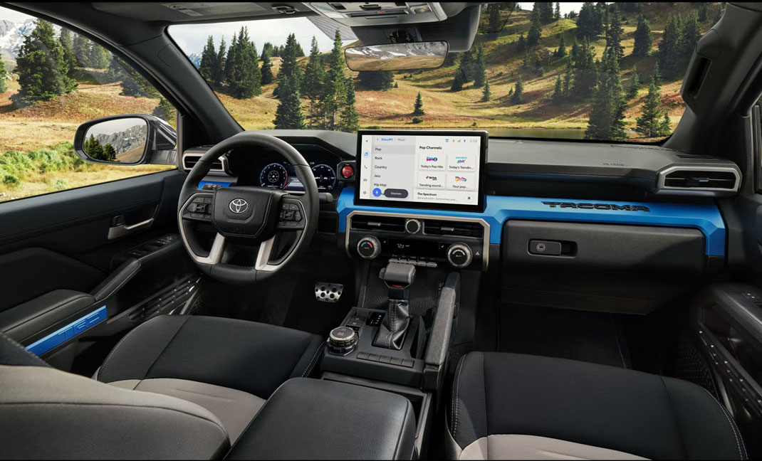 Toyota Tacoma interior showing dashboard, steering wheel, and infotainment screen