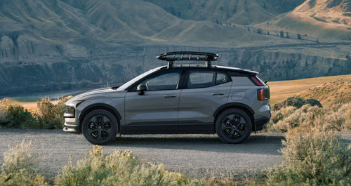 Volvo EX30 Cross Country with roof rack exploring rugged terrain, showcasing outdoor capability, adventure-focused features, and electric SUV innovation