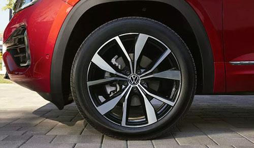 Volkswagen Atlas alloy wheel close up showing modern rim design and tire detail