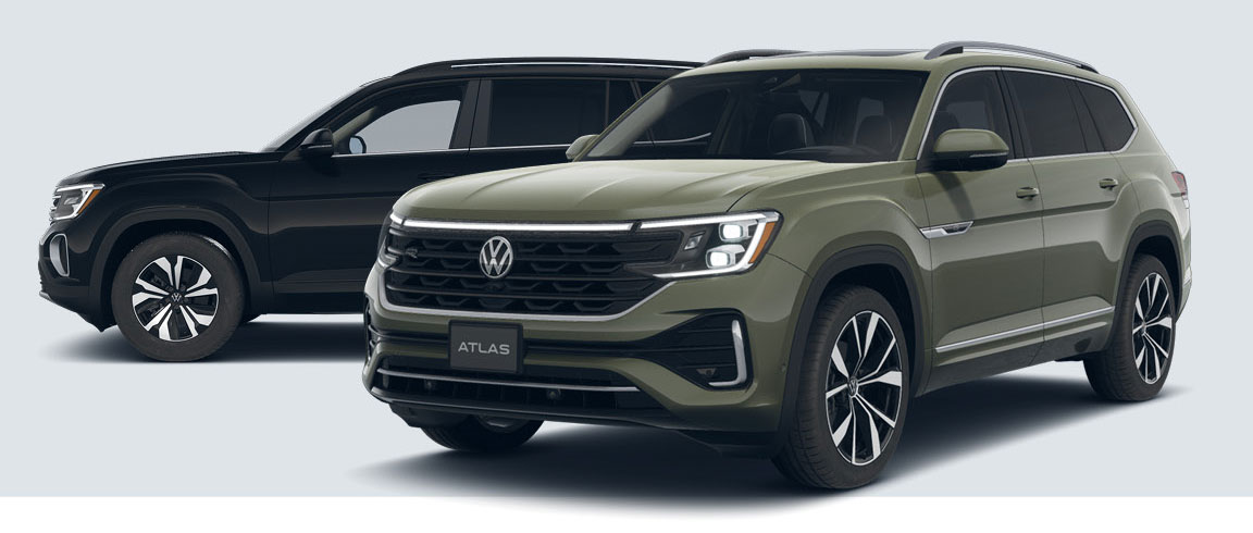 Volkswagen Atlas SUVs in black and green front three quarter studio view