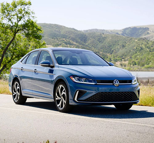 Volkswagen Jetta parked in a natural landscape showcasing sophisticated exterior styling and compact sedan versatility